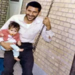 شهید غلامرضا صالحی به همراه فرزند